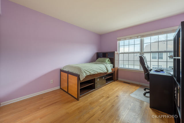 1270 Georgetown Way Vernon Hills, IL 60061 - Photo 15 of 25 a bedroom with a bed and a window