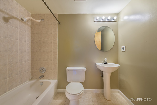 1270 Georgetown Way Vernon Hills, IL 60061 - Photo 25 of 25 a bathroom with a toilet sink and mirror