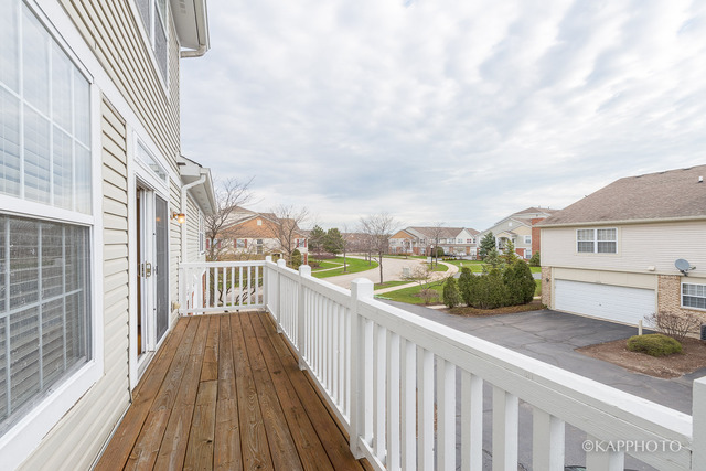 1270 Georgetown Way Vernon Hills, IL 60061 - Photo 8 of 25 a view of a house with a roof deck