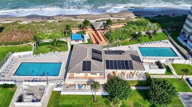 a view of a balcony with wooden floor