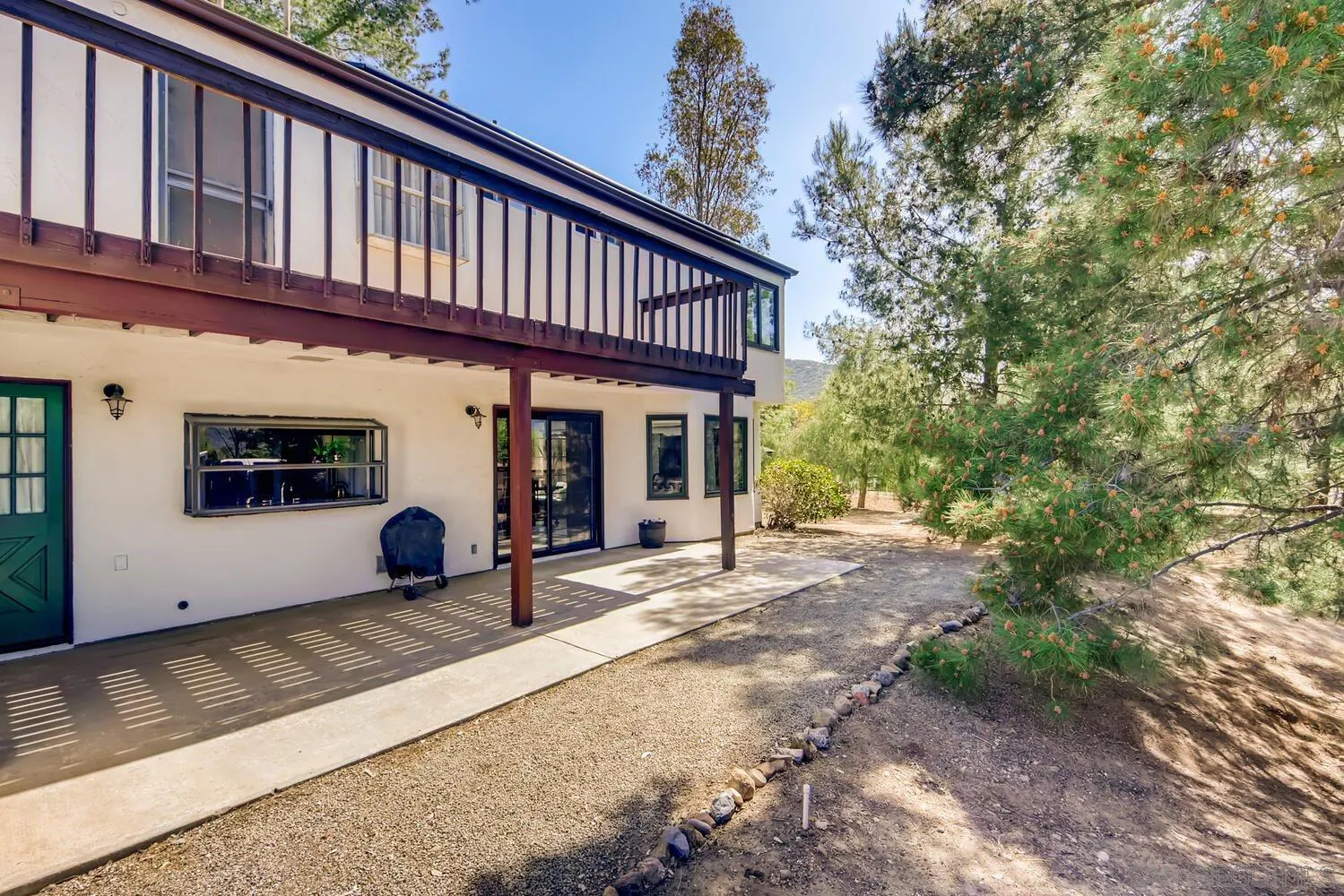 24331 Del Amo Road Ramona, CA 92065 - Photo 26 of 28 a view of a house with a patio