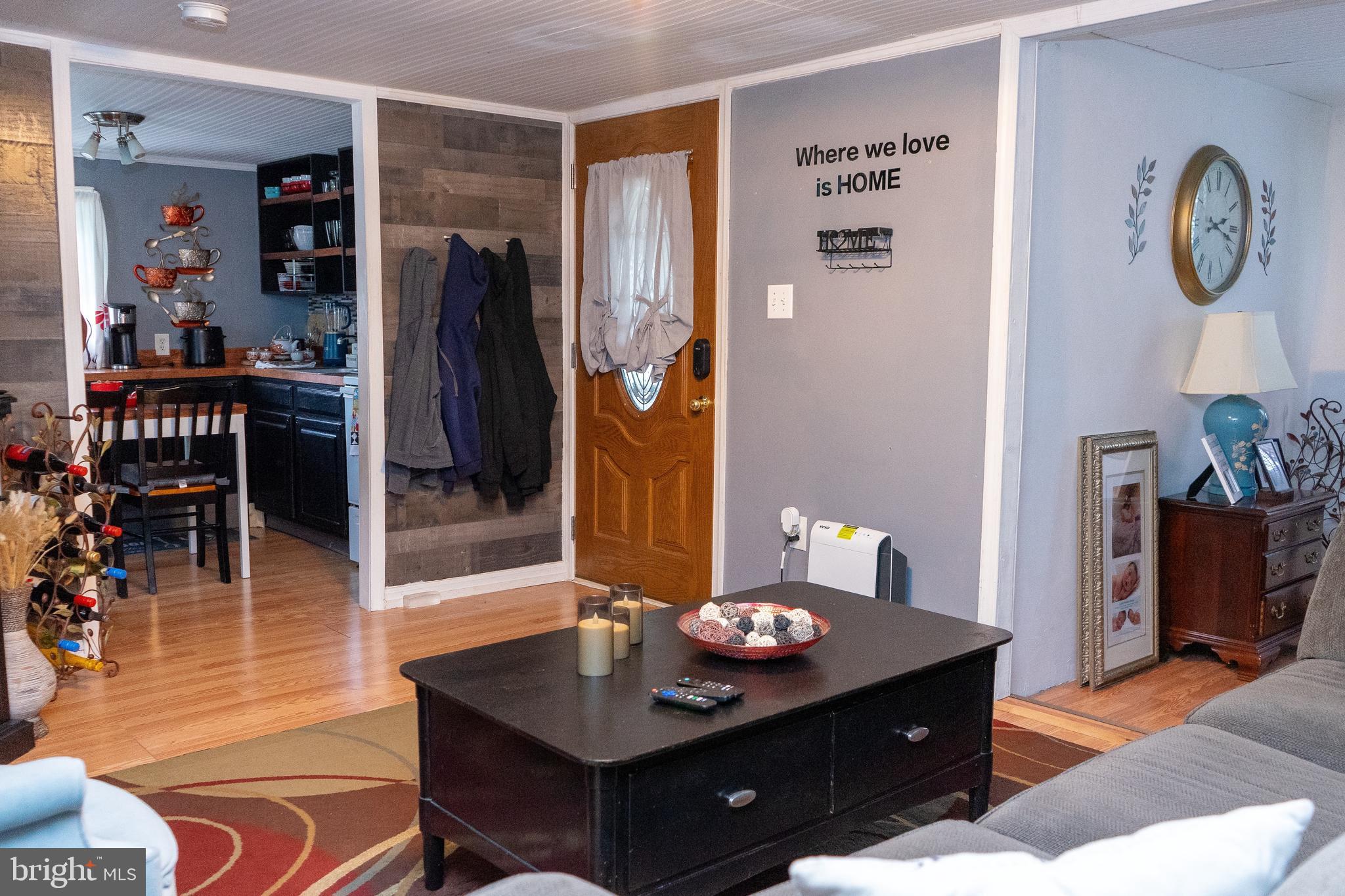 112 Trailway Road Middle River, MD 21220 - Photo 12 of 32 a living room with furniture and a table