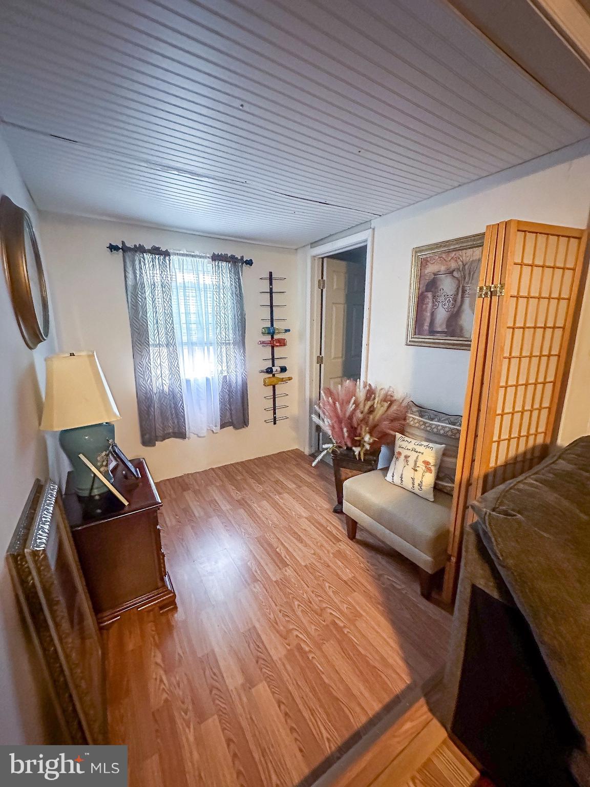 112 Trailway Road Middle River, MD 21220 - Photo 16 of 32 a living room with furniture and a window