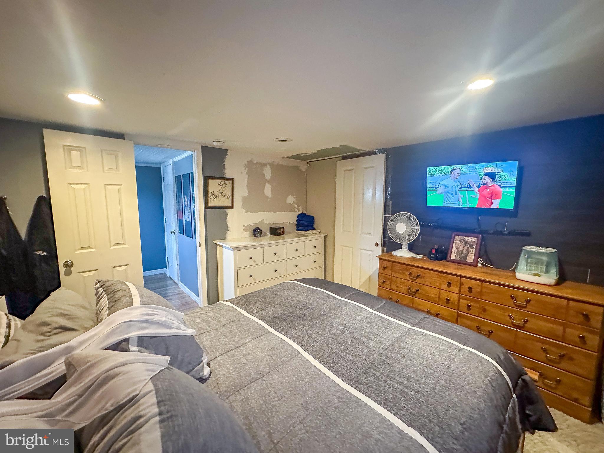 112 Trailway Road Middle River, MD 21220 - Photo 17 of 32 a bed room with a bed and a television