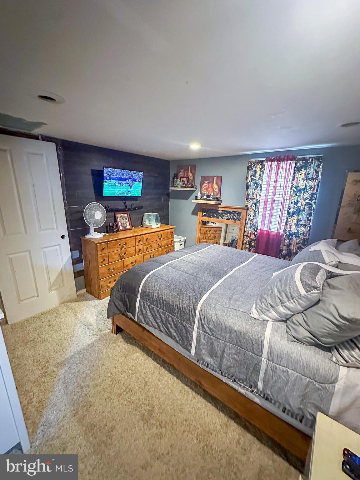 112 Trailway Road Middle River, MD 21220 - Photo 19 of 32 a bedroom with a bed and a couch