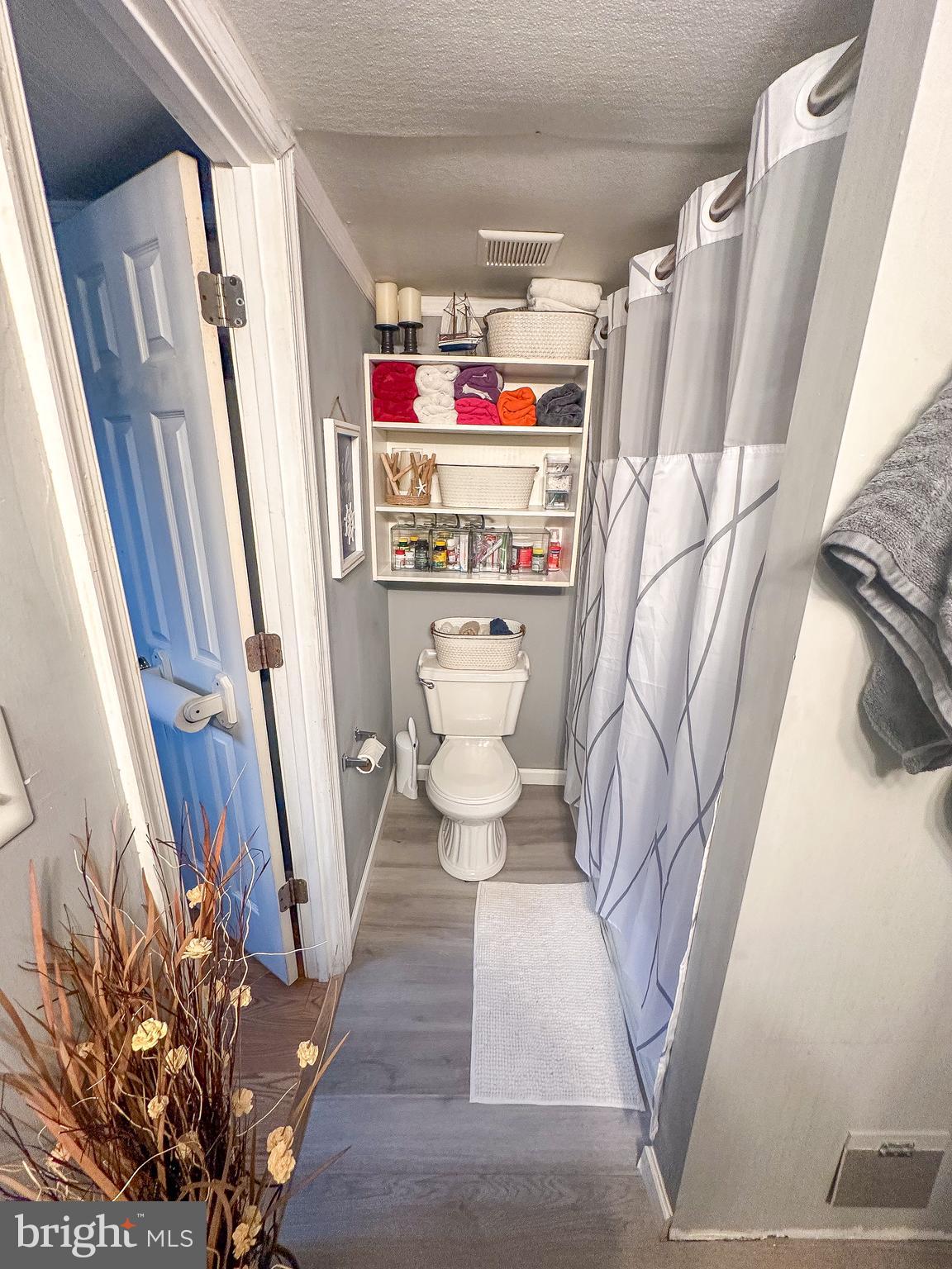 112 Trailway Road Middle River, MD 21220 - Photo 26 of 32 a bathroom with a toilet and a shower