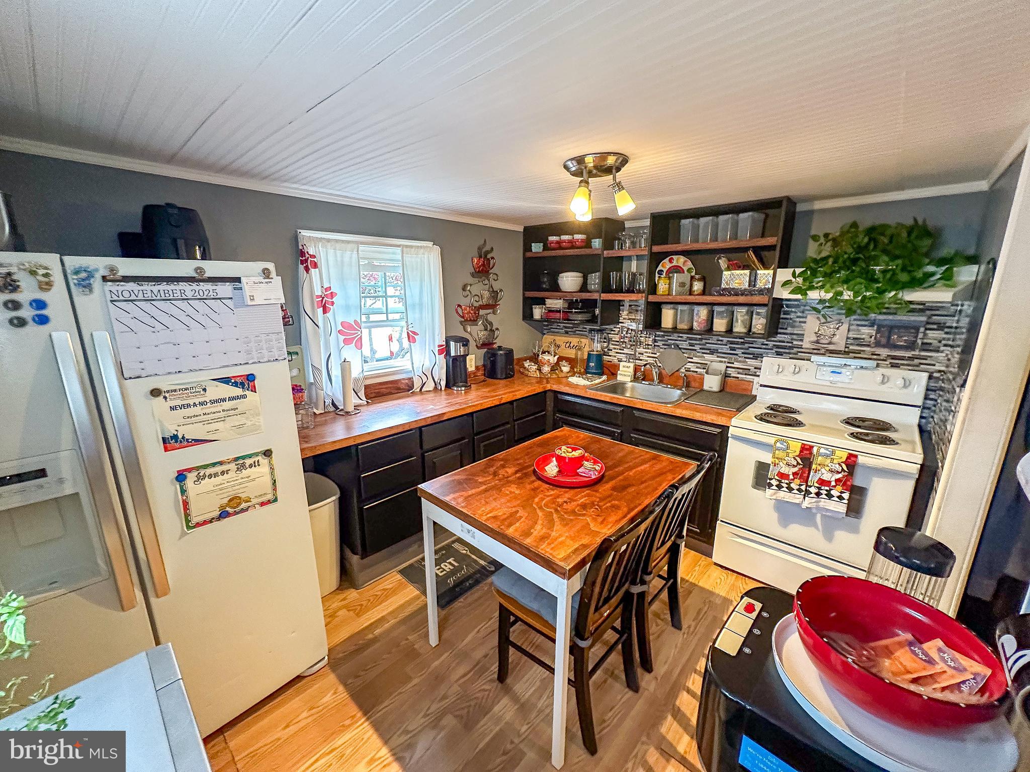 112 Trailway Road Middle River, MD 21220 - Photo 6 of 32 a reading room with furniture and wooden floor