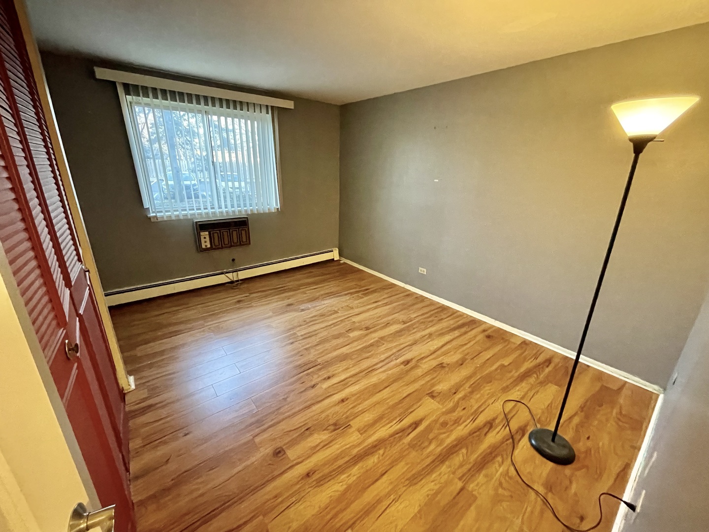 Undisclosed Address Palatine, IL 60074 - Photo 5 of 6 a view of an empty room with a window