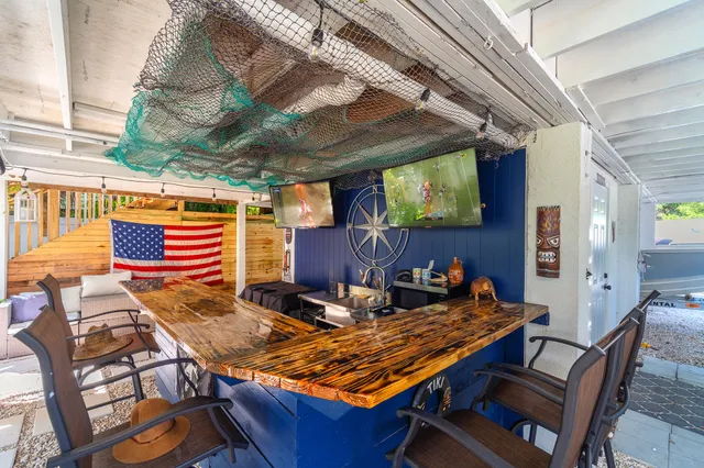 a bathroom with a sink toilet and a mirror