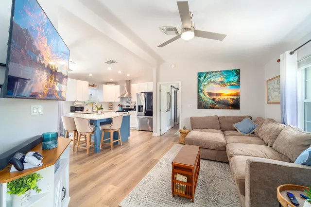 a workspace with furniture hardwood and a window