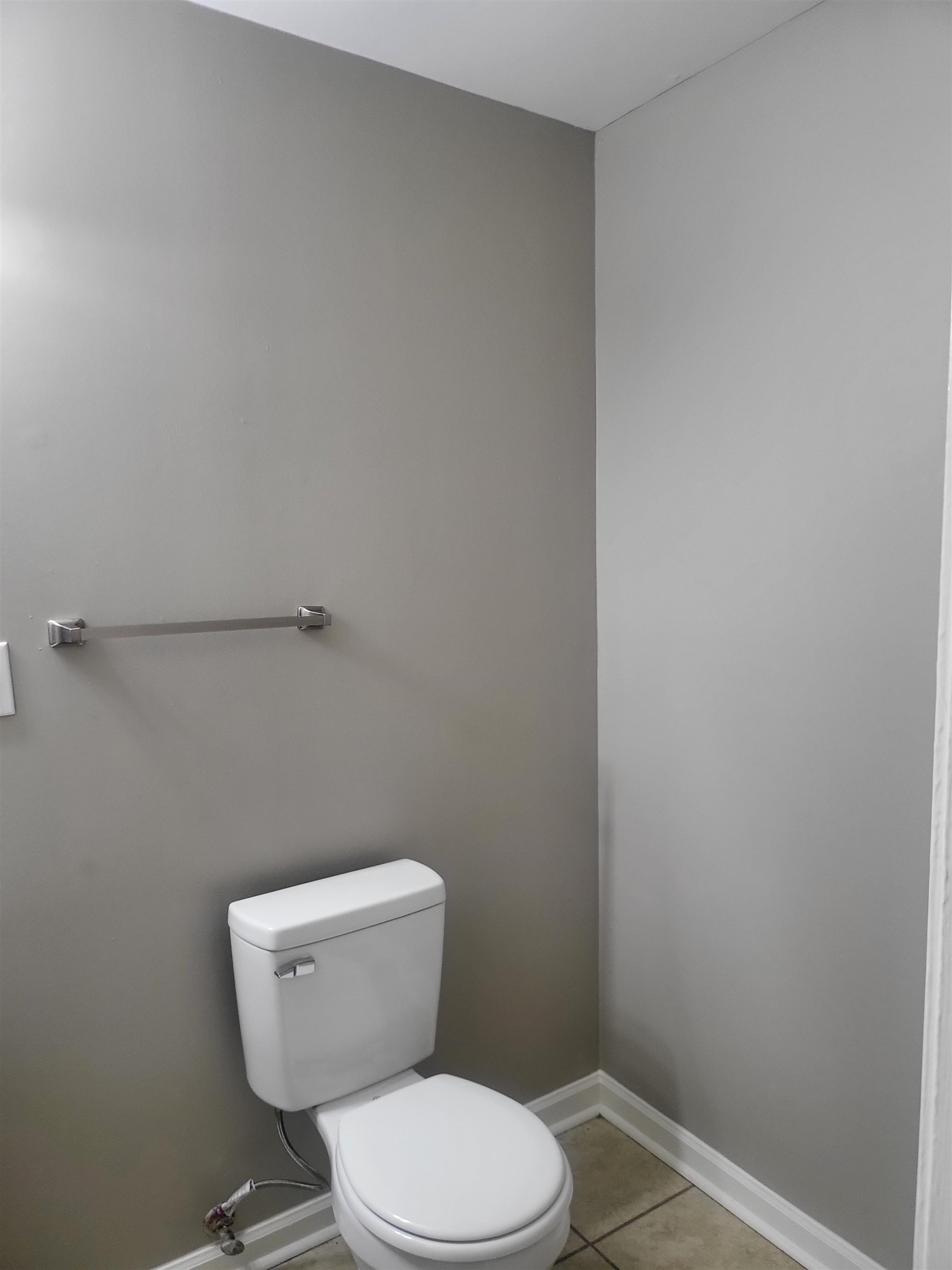 1769 Capri Street Memphis, TN 38117 - Photo 16 of 19 Bathroom featuring light tile patterned flooring and toilet