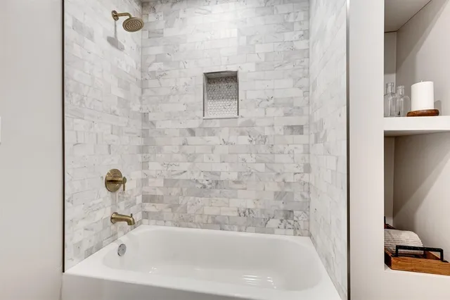 a bathroom with a bathtub