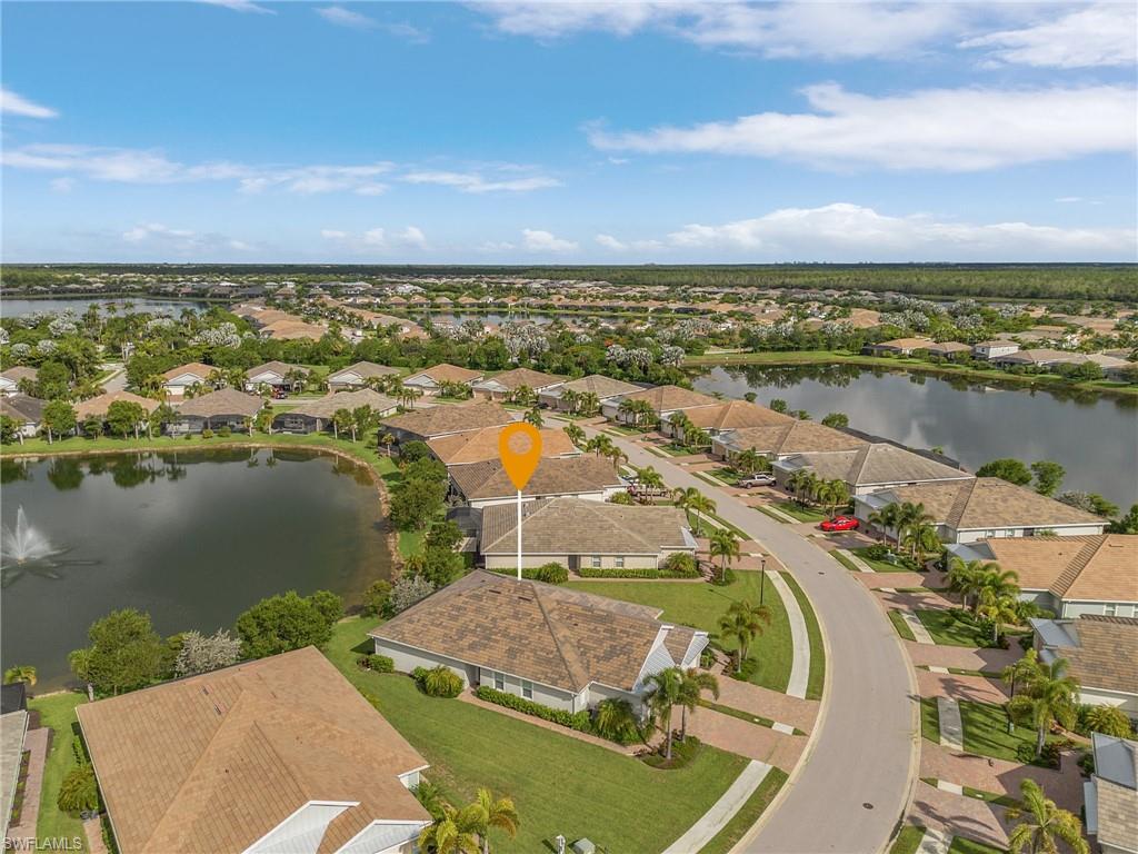 14618 Edgewater Circle Naples, FL 34114 - Photo 29 of 30 Bird's eye view with a water view