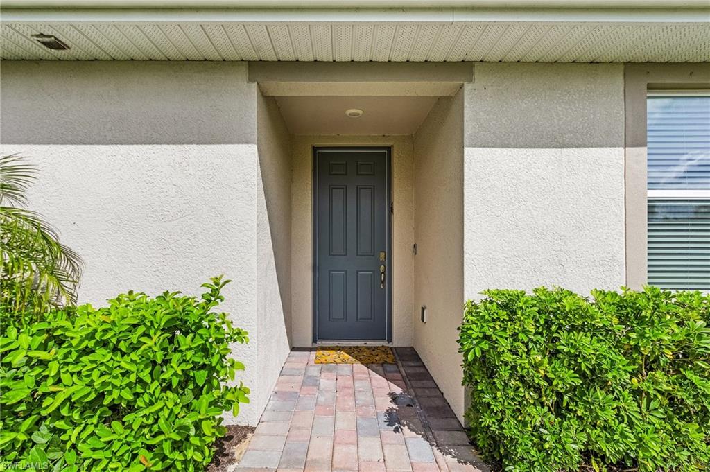 14618 Edgewater Circle Naples, FL 34114 - Photo 4 of 30 View of property entrance