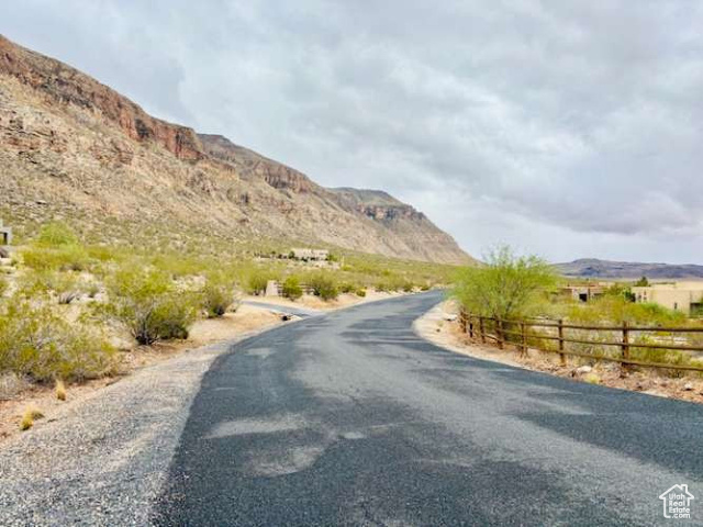 3391 South 850 West Hurricane, UT 84737 - Photo 3 of 16 View of asphalt road featuring a mountain view and a view of countryside