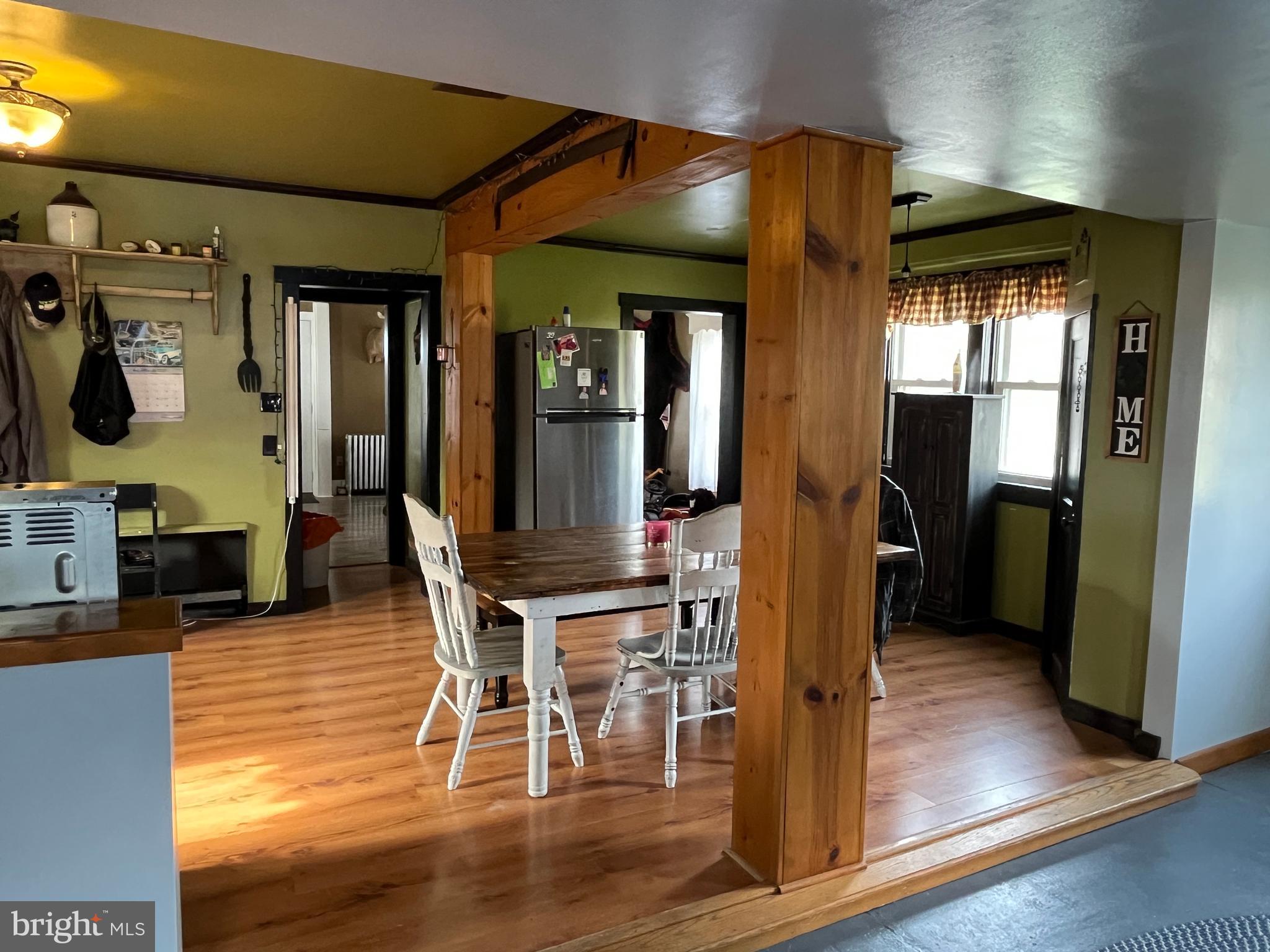 2 West High Street McClure, PA 17841 - Photo 11 of 40 a view of a dining room with furniture and wooden floor