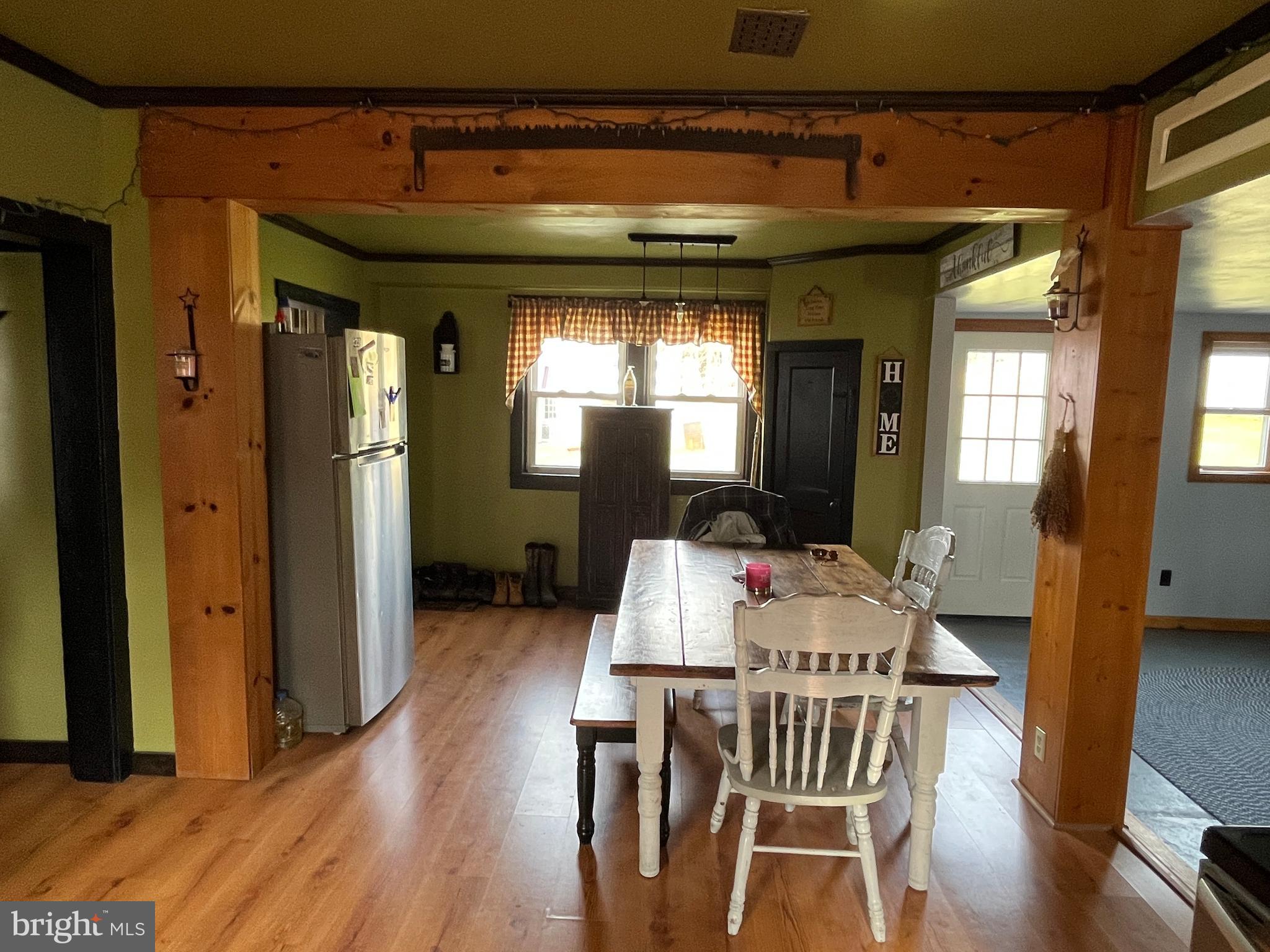 2 West High Street McClure, PA 17841 - Photo 13 of 40 a view of a dining room with furniture and wooden floor