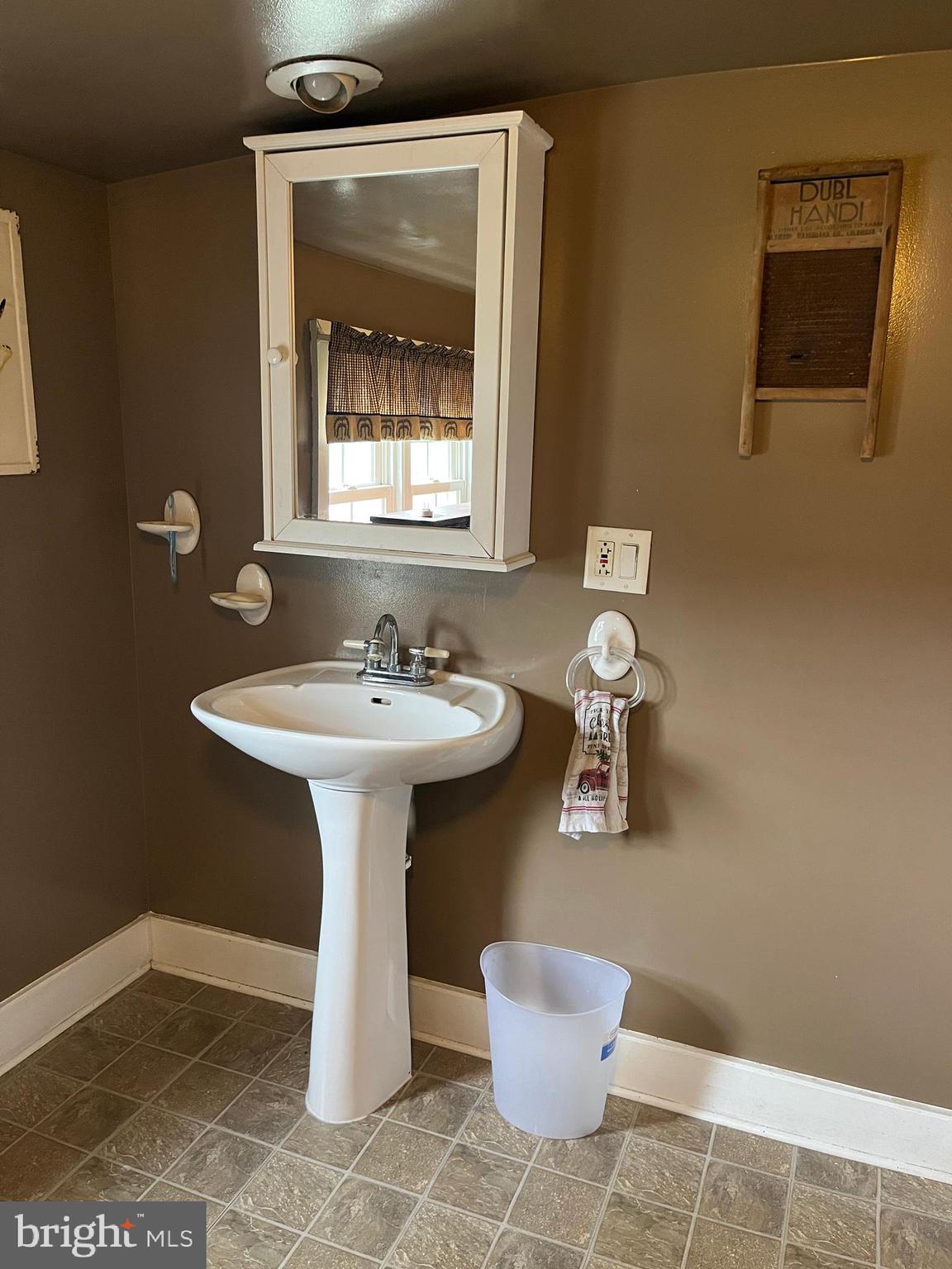 2 West High Street McClure, PA 17841 - Photo 25 of 40 a bathroom with a sink toilet and mirror