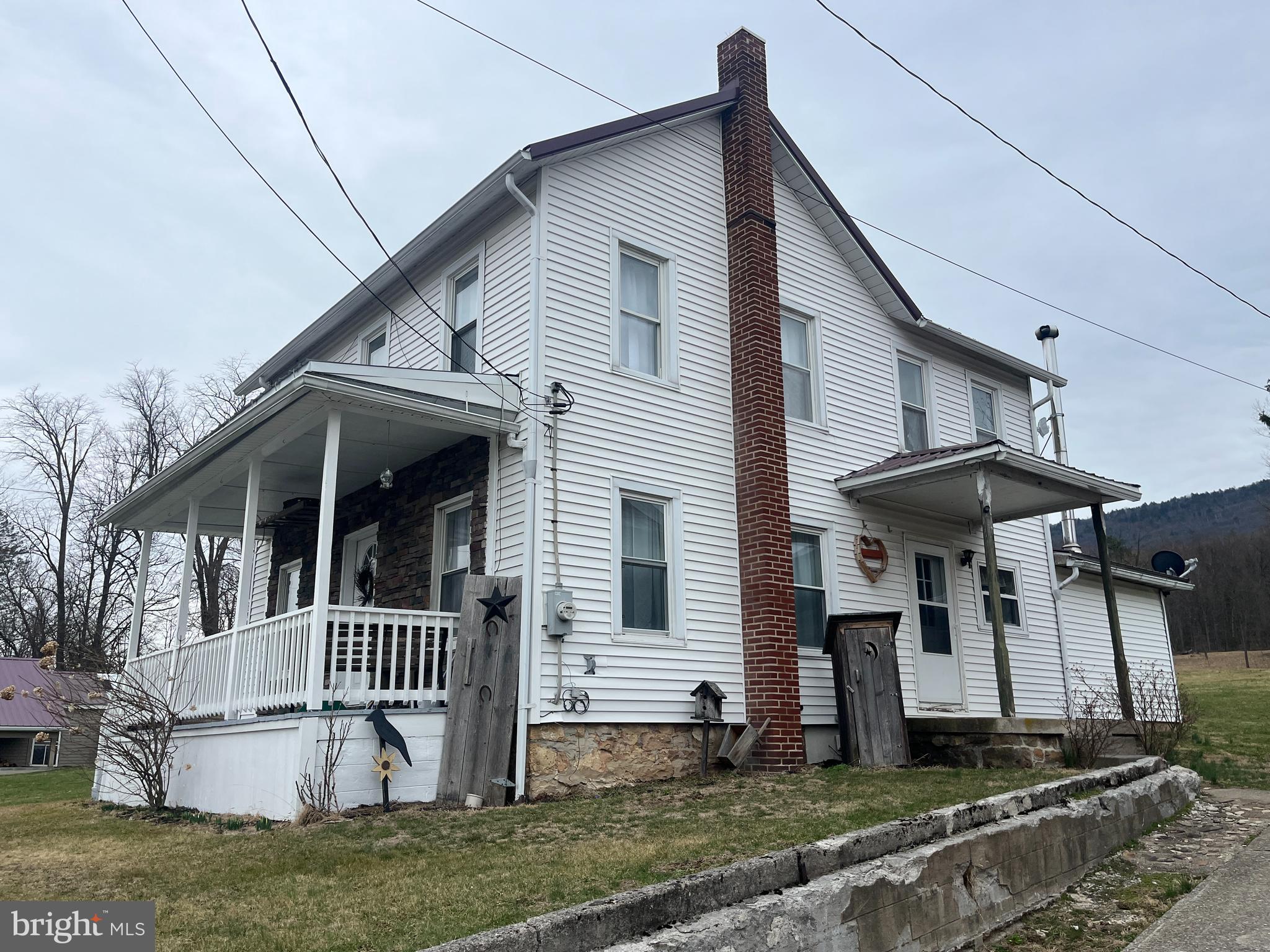2 West High Street McClure, PA 17841 - Photo 29 of 40 a front view of a house with a porch