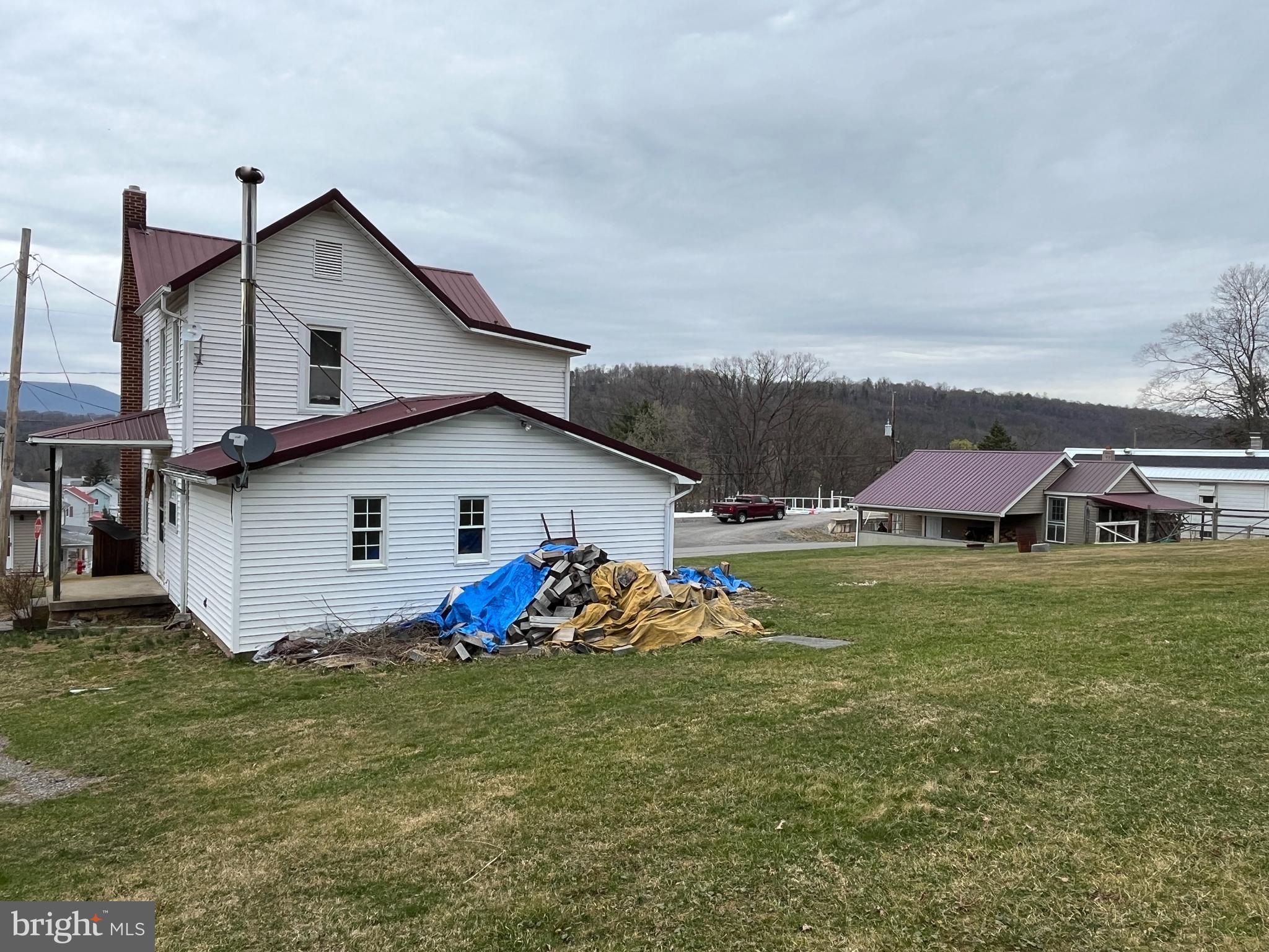2 West High Street McClure, PA 17841 - Photo 34 of 40 a view of a house with a yard and sitting area