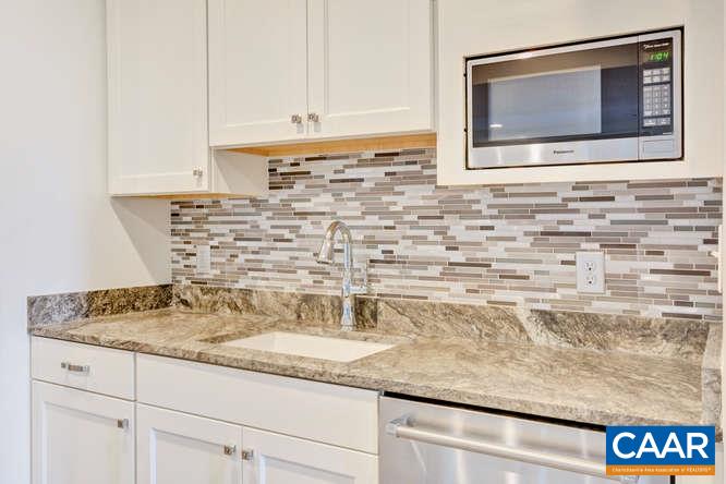 2474 Summit Ridge Trail Charlottesville, VA 22911 - Photo 15 of 16 a kitchen with granite countertop a sink and a stove