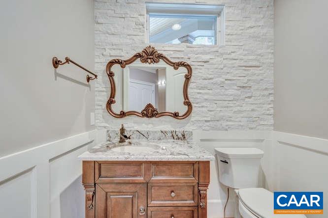 2474 Summit Ridge Trail Charlottesville, VA 22911 - Photo 9 of 16 a bathroom with a sink and a mirror