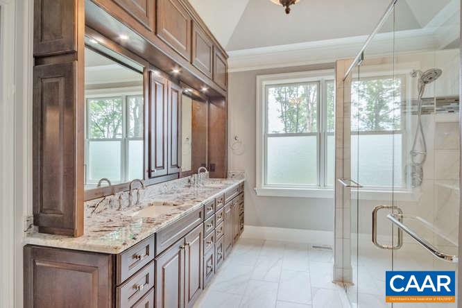 2474 Summit Ridge Trail Charlottesville, VA 22911 - Photo 10 of 16 a bathroom with a granite countertop bathtub and a sink