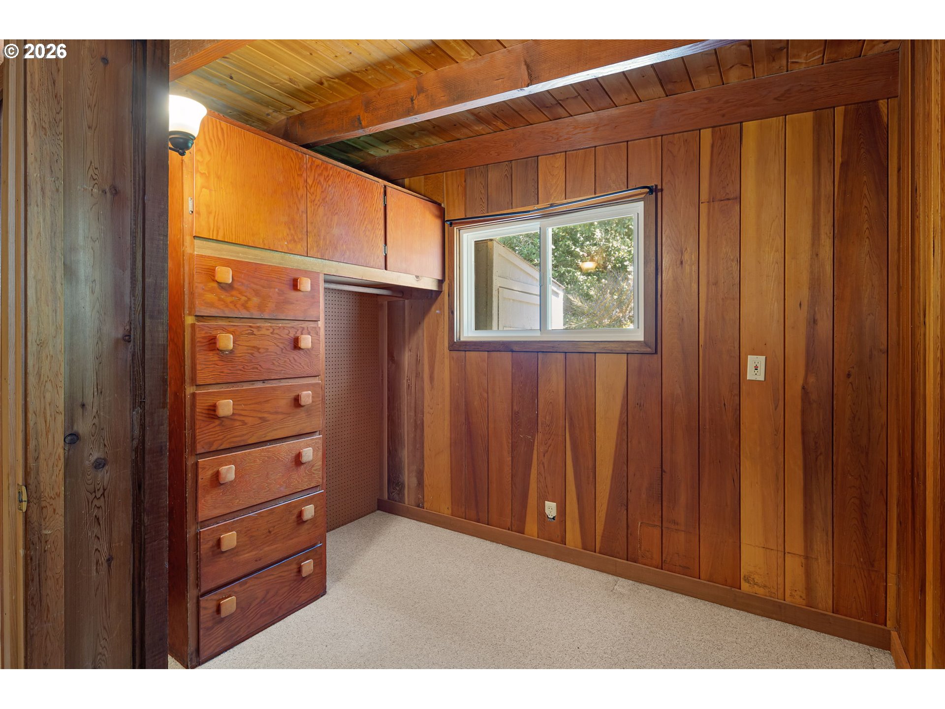 88481 1st Avenue Florence, OR 97439 - Photo 13 of 43 a view of room with window and wardrobe