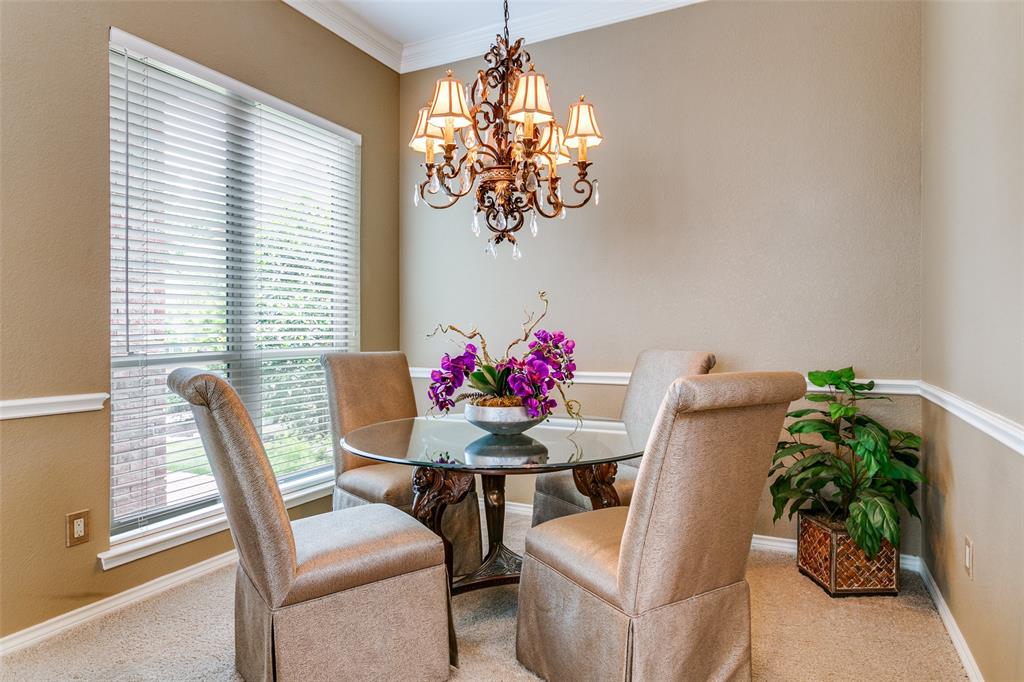303 Old York Road Irving, TX 75063 - Photo 5 of 26 a view of a dining room with furniture and a window
