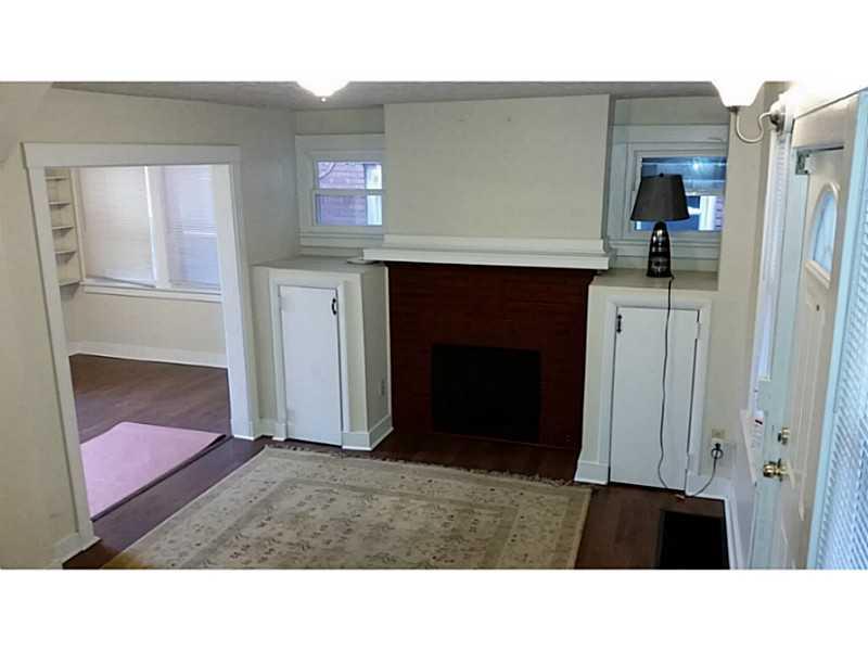 125 Burrows Street Pittsburgh, PA 15213 - Photo 4 of 18 Living Room. Living Room with fireplace and built-ins