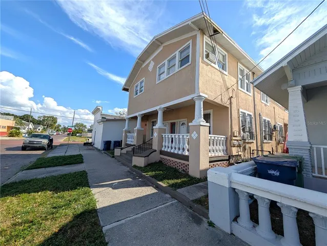 a front view of a building with street view