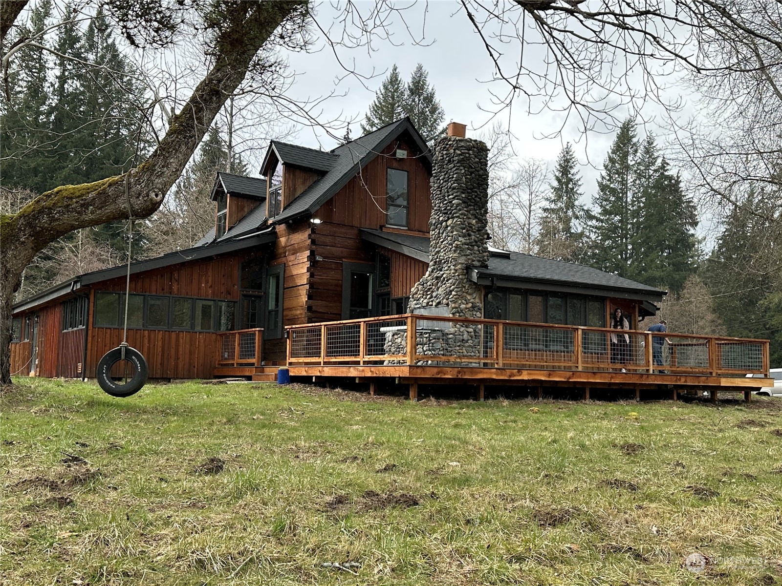 4915 Scherrer Road Granite Falls, WA 98252 - Photo 1 of 3 a view of a house with a yard and sitting area