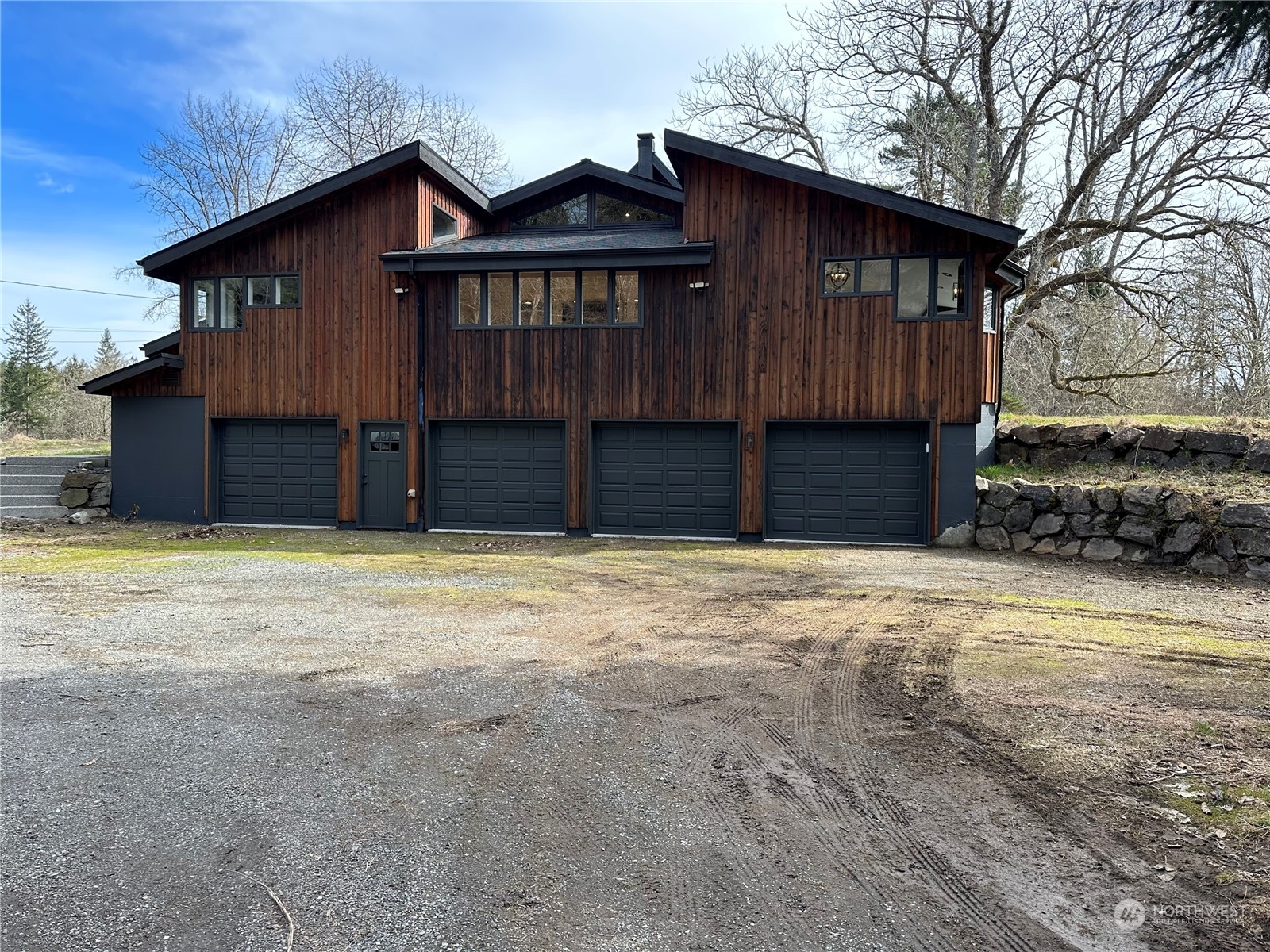 4915 Scherrer Road Granite Falls, WA 98252 - Photo 2 of 3 a house with a yard