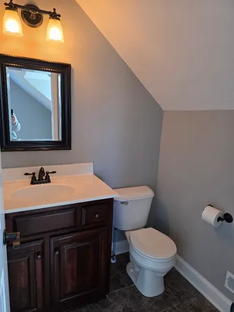 a view of balcony with furniture