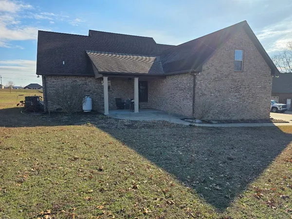 a view of a lake with a big yard