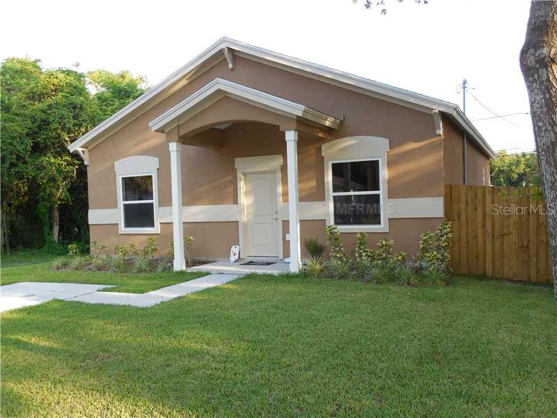 712 Butler Street Safety Harbor, FL 34695 - Photo 1 of 1 a front view of house with yard and green space
