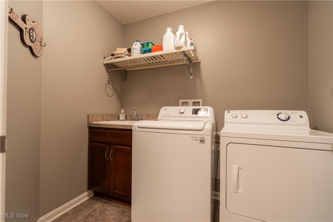 6408 Rustic Ridge Circle Northwest Massillon, OH 44646 - Photo 19 of 31 Washing machine and dryer
