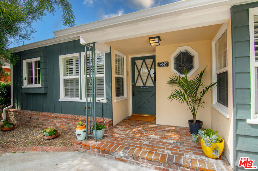 5849 Goodland Avenue Valley Village, CA 91607 - Photo 1 of 25 a front view of a house with patio