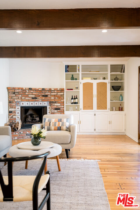 5849 Goodland Avenue Valley Village, CA 91607 - Photo 12 of 25 a view of a dining room with furniture and wooden floor