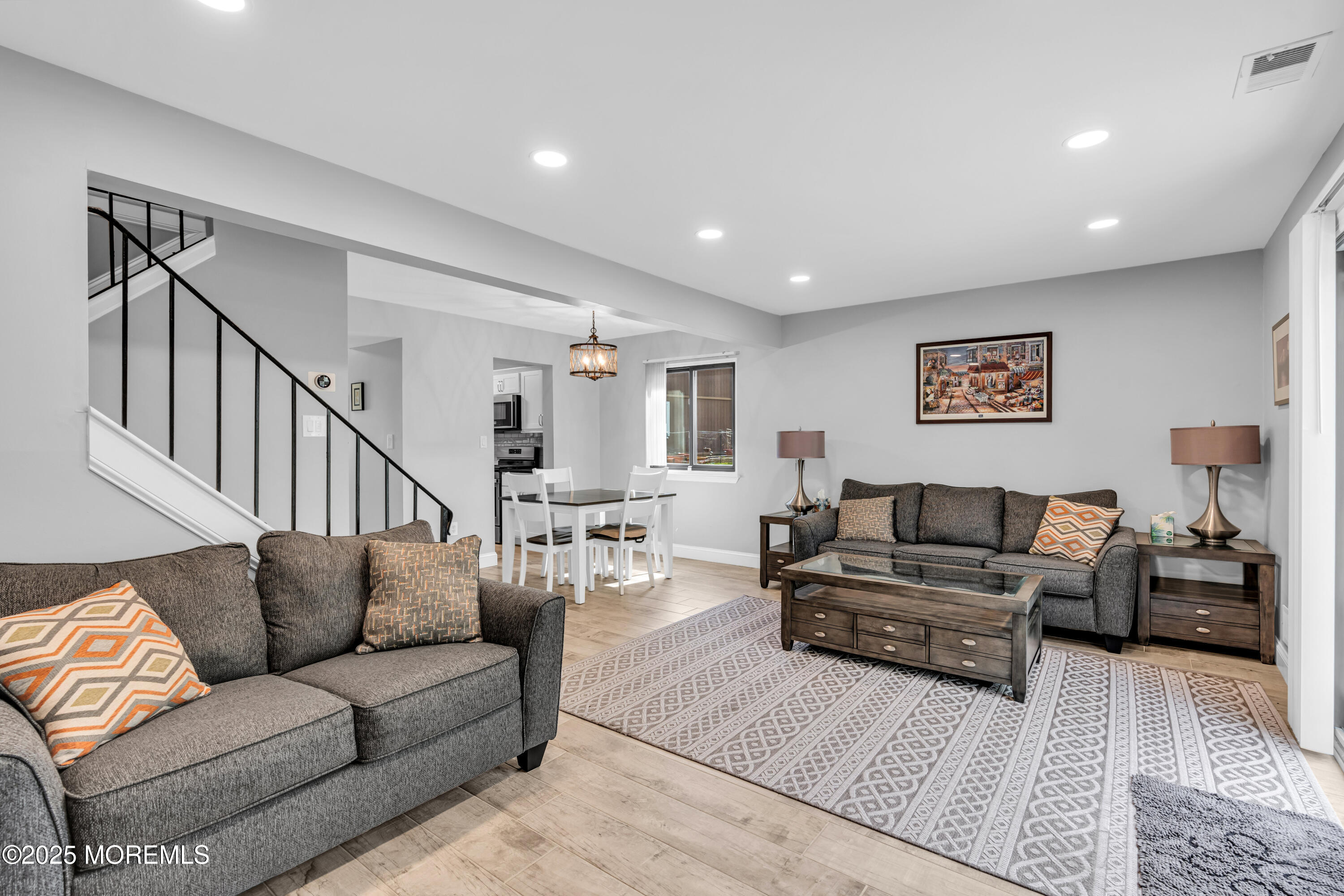 13 Owl Road, Unit 1000 Howell, NJ 07731 - Photo 16 of 39 a living room with furniture or couch and a potted plant
