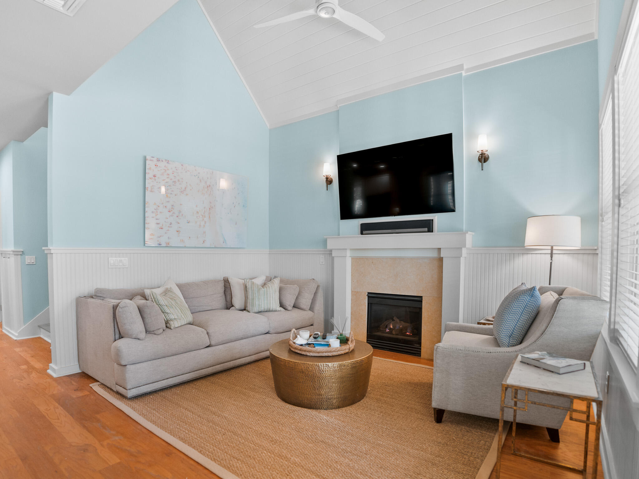 253 Salt Lane Watersound, FL 32461 - Photo 11 of 56 a living room with furniture a flat screen tv and a fireplace