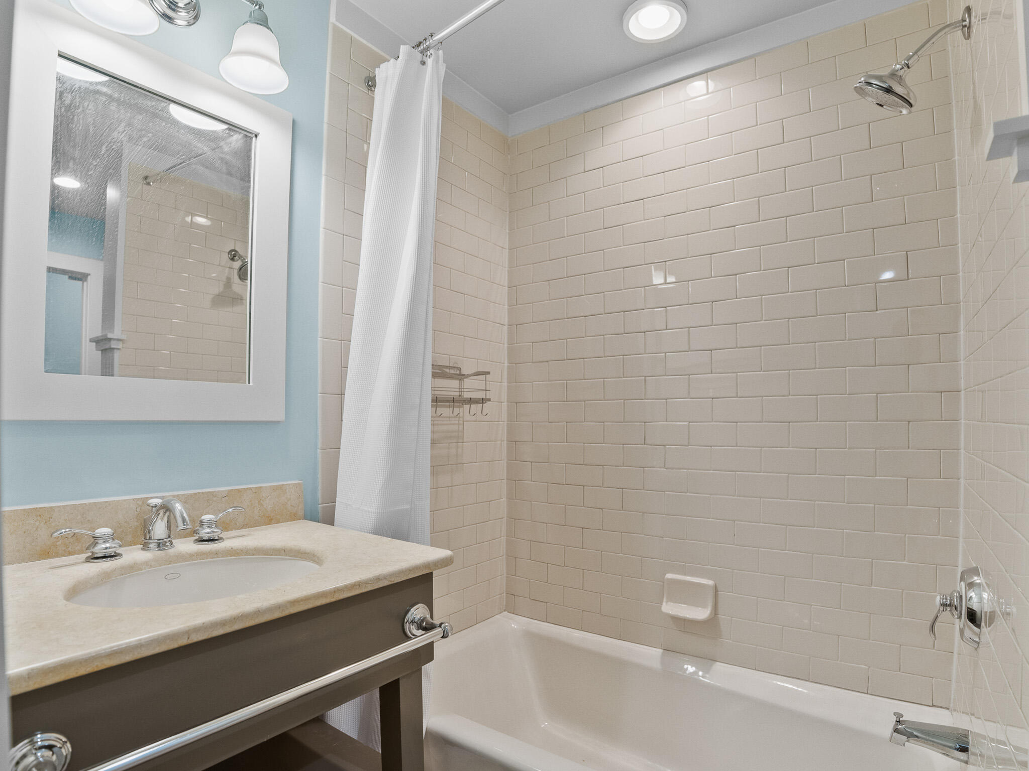 253 Salt Lane Watersound, FL 32461 - Photo 20 of 56 a bathroom with a sink and a mirror