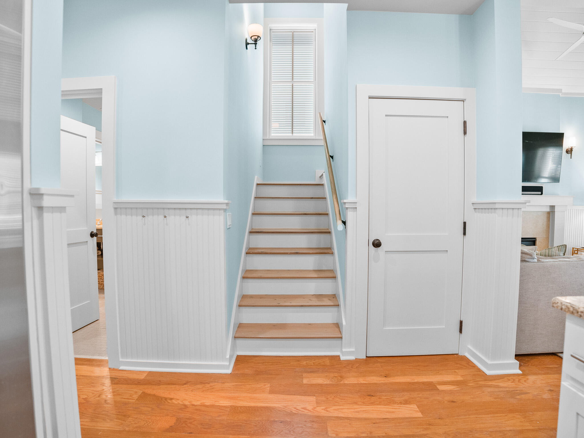 253 Salt Lane Watersound, FL 32461 - Photo 26 of 56 a view of a livingroom with wooden floor and entryway