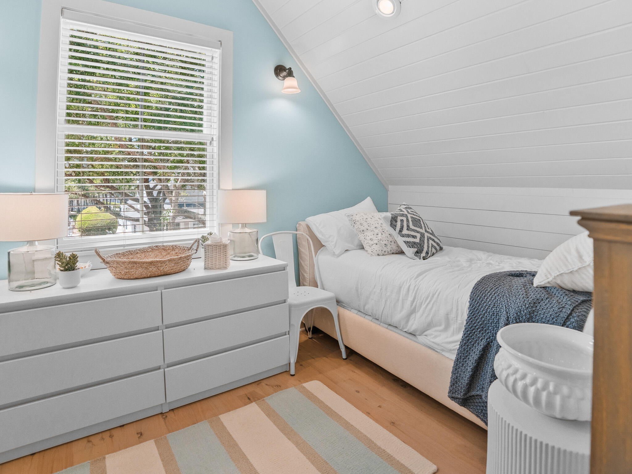 253 Salt Lane Watersound, FL 32461 - Photo 34 of 56 a bedroom with a bed and a sink