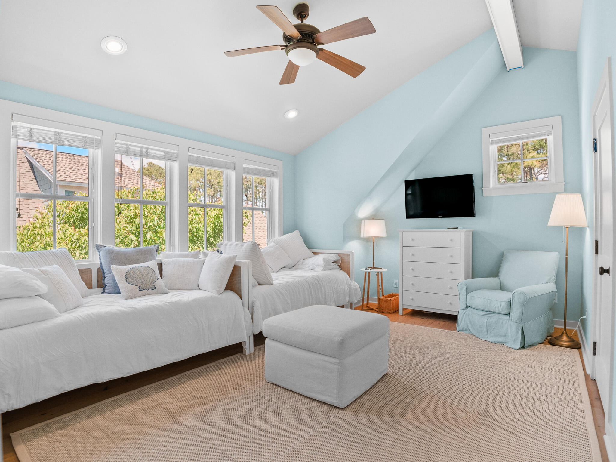 253 Salt Lane Watersound, FL 32461 - Photo 35 of 56 a living room with furniture and a flat screen tv