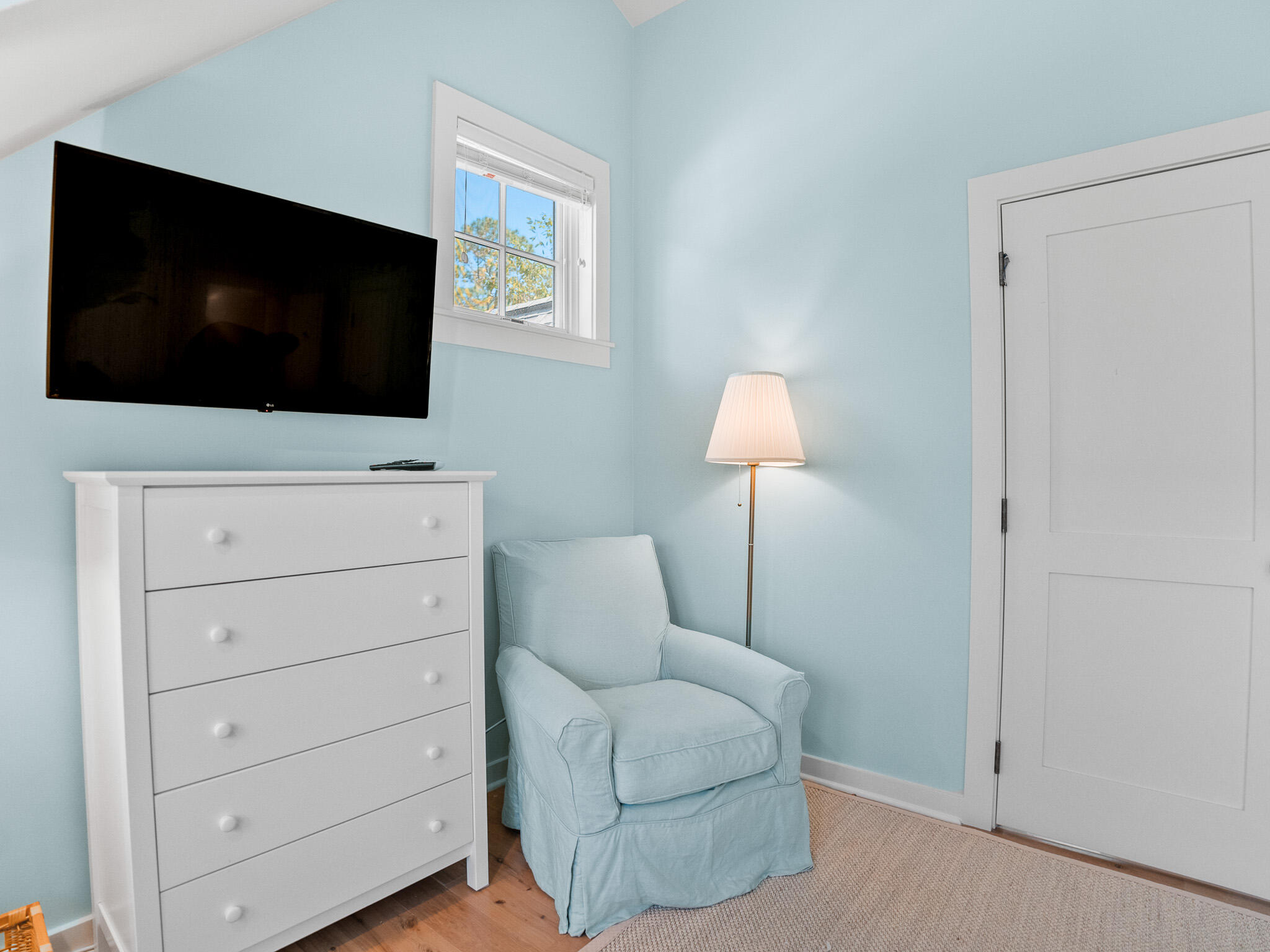 253 Salt Lane Watersound, FL 32461 - Photo 37 of 56 a living room with furniture and a flat screen tv