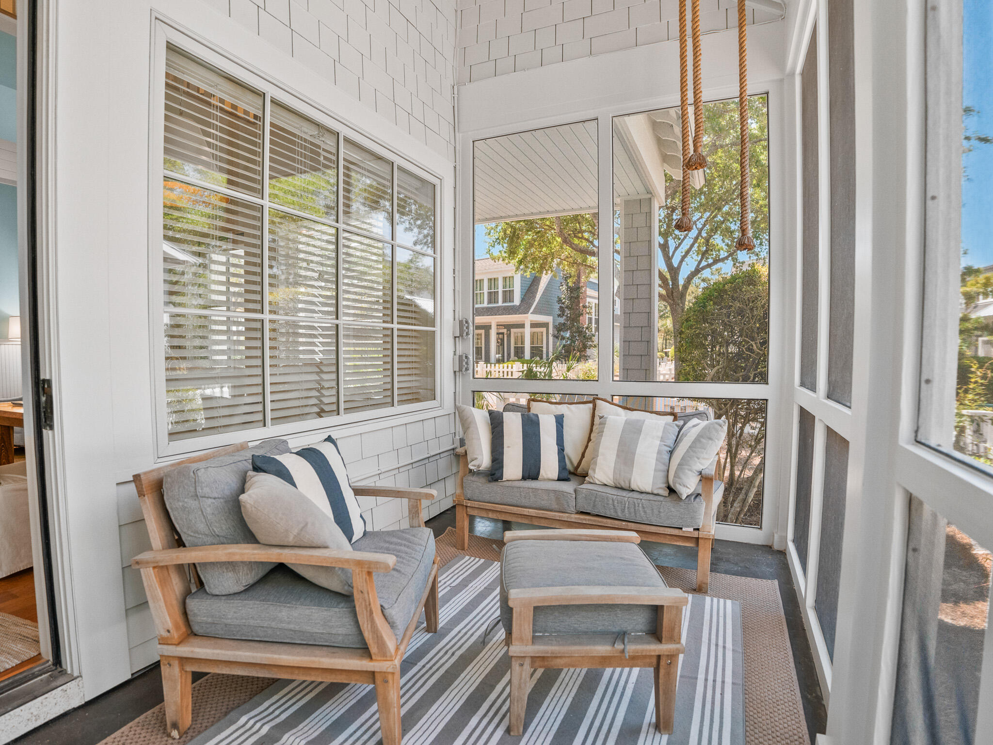 253 Salt Lane Watersound, FL 32461 - Photo 40 of 56 a view of a balcony with furniture and wooden floor