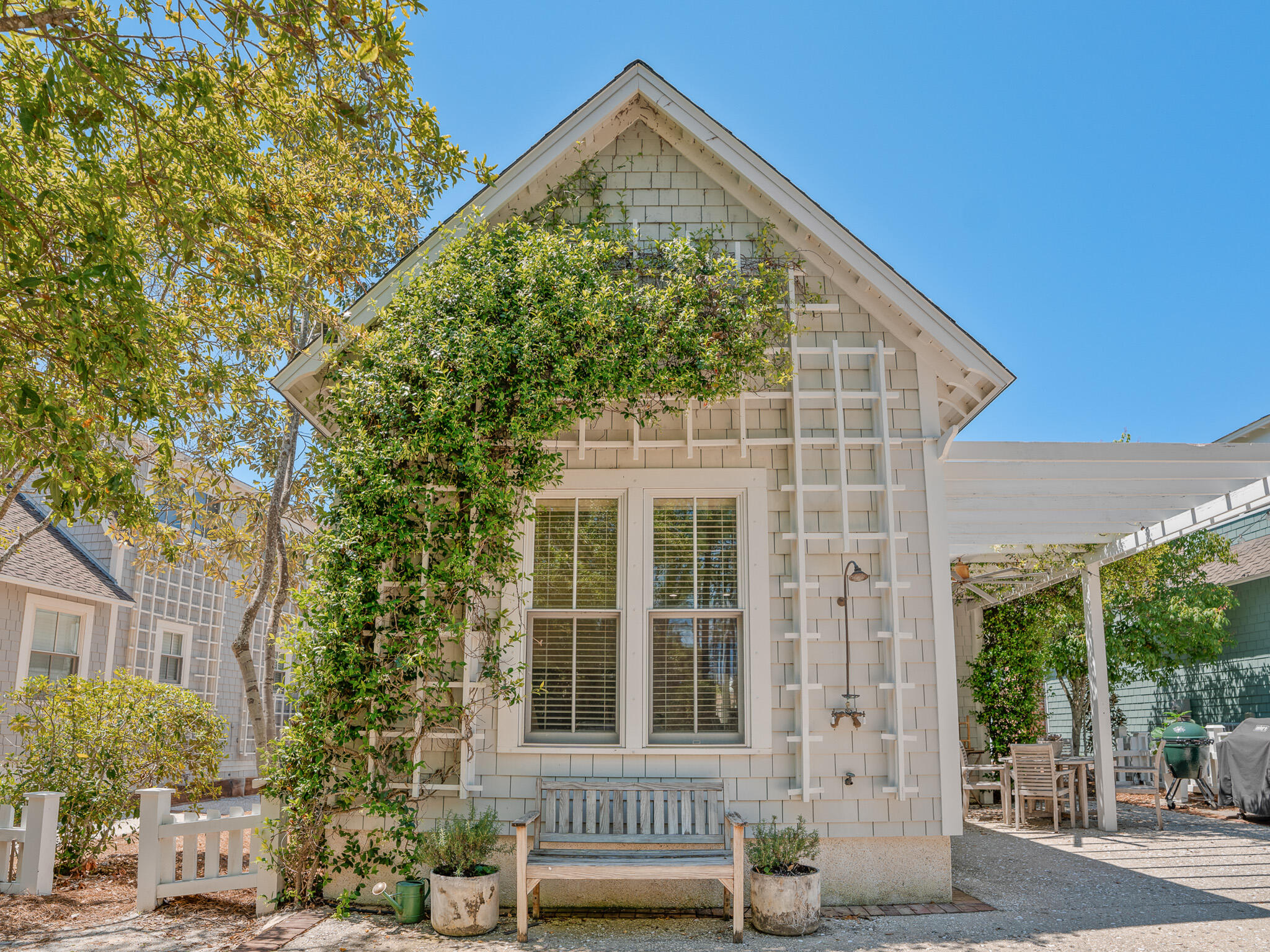 253 Salt Lane Watersound, FL 32461 - Photo 42 of 56 a view of a house with a small garden