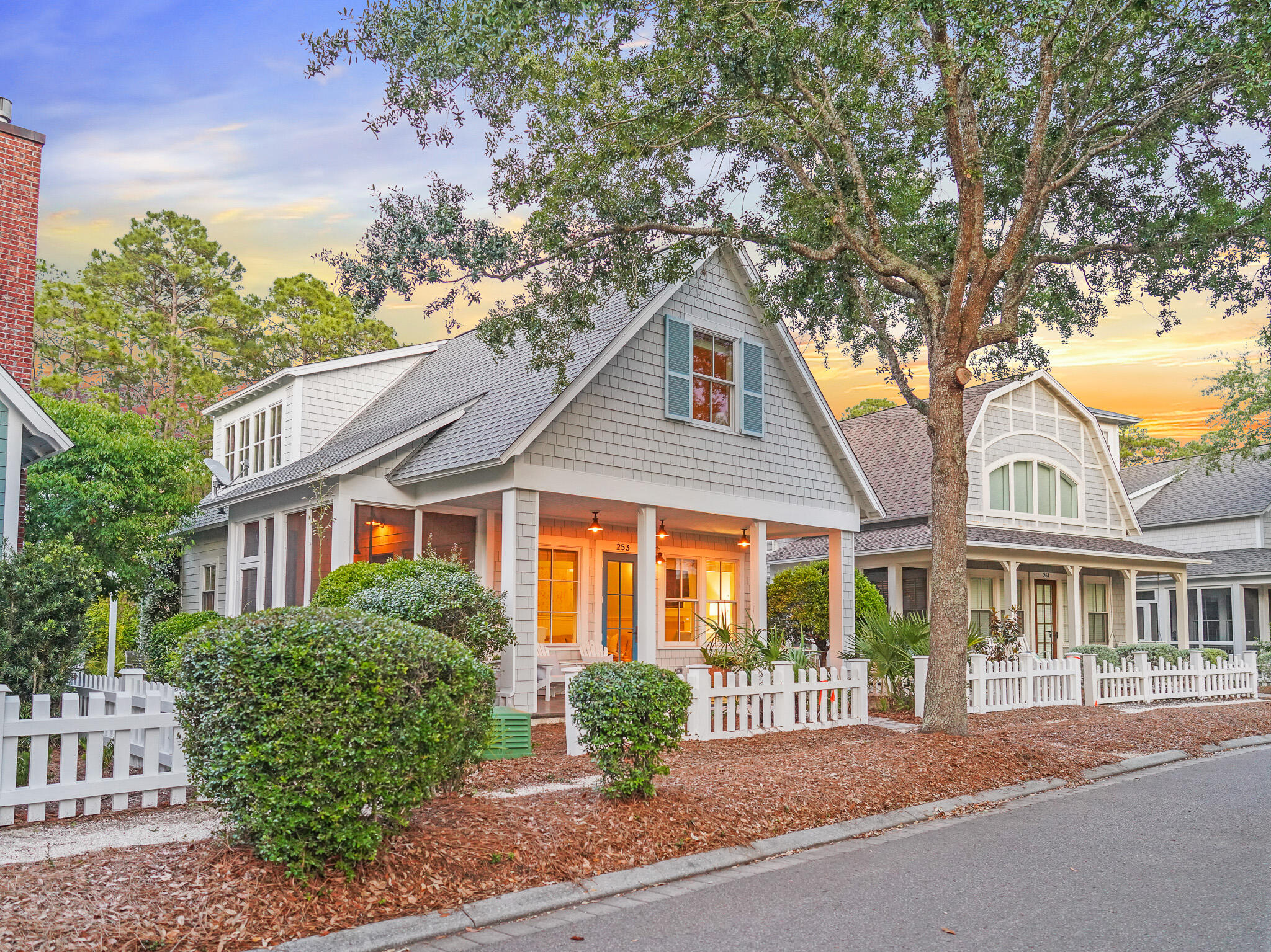 253 Salt Lane Watersound, FL 32461 - Photo 47 of 56 a front view of a house with garden and plants