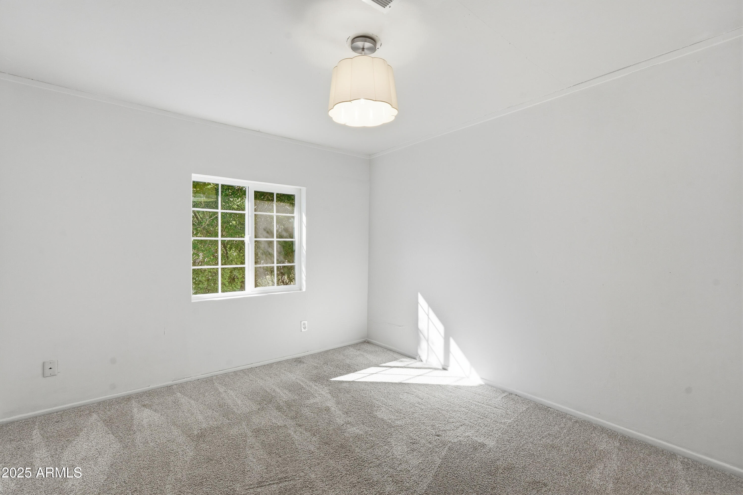 21047 South 156th Street Gilbert, AZ 85298 - Photo 23 of 40 an empty room with a window